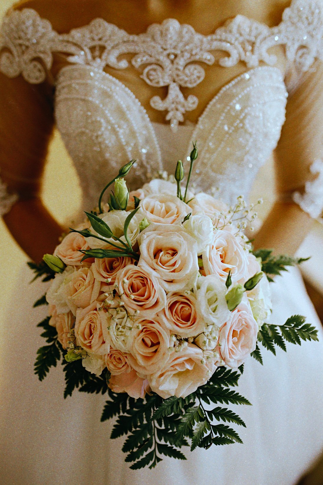 Bride in Wedding Dress Holding Bouquet 